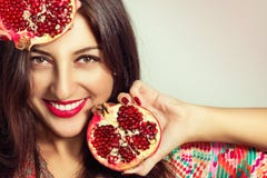 Portrait Of Beautiful Girl With Pomegranate. Stock Photo Portrait Of Beautiful Girl With Pomegranate. Stock Photo