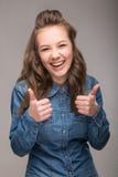 Portrait Of Energetic Fun Girl Student On A Gray Background In A Royalty Free Stock Image