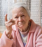Portrait Of Old Woman In Angry Gesture Royalty Free Stock Photo