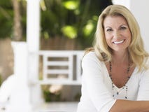 Portrait Of Smiling Middle Aged Woman Stock Photos