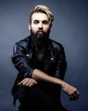 Portrait Of Young Bearded Hipster Guy Smiling On Gray Dark Background Close Up, Brutal Modern Man, Lifestyle People Royalty Free Stock Photo Portrait Of Young Bearded Hipster Guy Smiling On Gray Dark Background Close Up, Brutal Modern Man, Lifestyle People Royalty Free Stock Photo