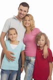 Portrait Of Young Happy Caucasian Family Standing Together With Royalty Free Stock Photo