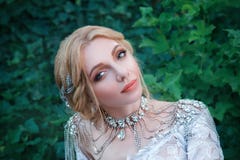 Portrait photo of pretty young woman with light white skin and delicate natural make-up, girl with blond braided hair stock photos Portrait photo of pretty young woman with light white skin and delicate natural make-up, girl with blond braided hair stock photos