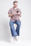 Portrait of Positive Caucasian Man with Handheld Cellphone stock image Portrait of Positive Caucasian Man with Handheld Cellphone stock image