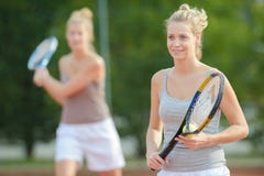 Portrait positive smiling professional female tennis player stock photo Portrait positive smiling professional female tennis player stock photo
