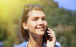 Portrait of pretty happy lovely young woman speaking on mobile p royalty free stock photography Portrait of pretty happy lovely young woman speaking on mobile p royalty free stock photography