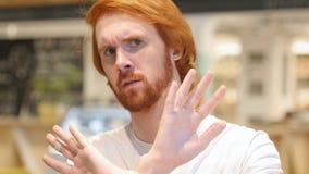 Portrait of Redhead Beard Man Rejecting Offer, Gesture royalty free stock photo Portrait of Redhead Beard Man Rejecting Offer, Gesture royalty free stock photo