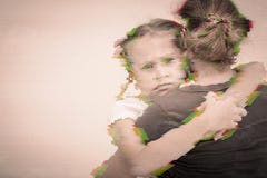 Portrait of a sad daughter hugging his mother. stock photo Portrait of a sad daughter hugging his mother. stock photo