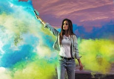 Portrait of a sensual woman making colorful smoke stock image Portrait of a sensual woman making colorful smoke stock image