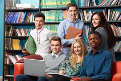 Portrait Of Teacher With Students In Library royalty free stock photos Portrait Of Teacher With Students In Library royalty free stock photos