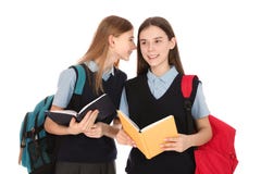 Portrait of teenage girls in school uniform with backpacks and books stock photos Portrait of teenage girls in school uniform with backpacks and books stock photos
