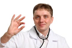 Portrait of thoughtful male doctor holding a pill stock image Portrait of thoughtful male doctor holding a pill stock image