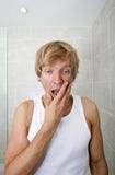 Portrait of tired man yawning in bathroom royalty free stock photography Portrait of tired man yawning in bathroom royalty free stock photography