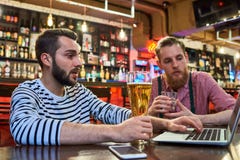 People Using Laptop in Bar royalty free stock photo People Using Laptop in Bar royalty free stock photo