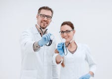 Portrait of two successful medical professional with a stethoscope stock photos Portrait of two successful medical professional with a stethoscope stock photos