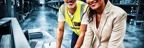 Portrait of warehouse manager and worker working together stock photography Portrait of warehouse manager and worker working together stock photography