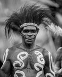 Portrait of a Warrior Asmat tribe in traditional headdress.