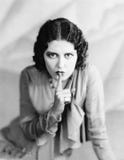 Portrait of woman shushing royalty free stock photography Portrait of woman shushing royalty free stock photography