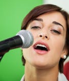 Portrait Of Woman Singing In Recording Studio stock photos Portrait Of Woman Singing In Recording Studio stock photos
