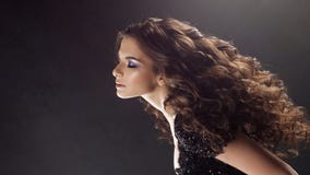 Portrait of a young attractive woman with gorgeous curly hair. Attractive brunette royalty free stock photos Portrait of a young attractive woman with gorgeous curly hair. Attractive brunette royalty free stock photos