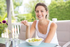 Portrait of young beauty woman eating salad Royalty Free Stock Image Portrait of young beauty woman eating salad Royalty Free Stock Image