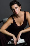 Portrait of young woman on dark background. stock photos Portrait of young woman on dark background. stock photos