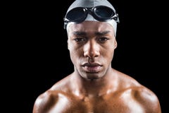 Portret pływaczka w swimming gogle i pływackiej nakrętce fotografia stock Portret pływaczka w swimming gogle i pływackiej nakrętce fotografia stock