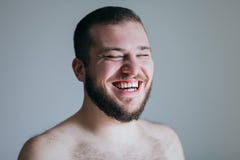 Portret van het lachen van de Jonge Mens stock afbeeldingen Portret van het lachen van de Jonge Mens stock afbeeldingen