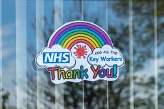 04/24/2020 Portsmouth, Hampshire, UK A rainbow in a houses window to thank the NHS and key workers during the Coronavirus or Covid