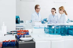 Positive group of scientists being high spirited royalty free stock images Positive group of scientists being high spirited royalty free stock images