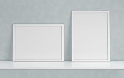 Poster frame mockup with blank copy space on grey background. Front view photo frame on white book shelf or desk. Digitally vector illustration Poster frame mockup with blank copy space on grey background. Front view photo frame on white book shelf or desk. Digitally vector illustration