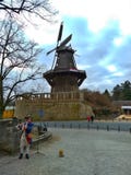 Potsdam / Germany - March 24 2018: An actor dressed as Frederick the Great plays the flute at the entrance to the park Sans Souci royalty free stock photography Potsdam / Germany - March 24 2018: An actor dressed as Frederick the Great plays the flute at the entrance to the park Sans Souci royalty free stock photography