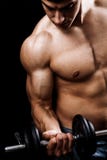 Powerful muscular man lifting weights Stock Photo Powerful muscular man lifting weights Stock Photo