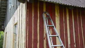Pracownik farby drabinowa ściana zbiory Pracownik farby drabinowa ściana zbiory