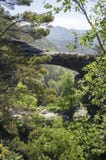 Pravcicka brana is a narrow rock formation located in Bohemian Switzerland, late spring scenery with greenery, blue sky and stock photos Pravcicka brana is a narrow rock formation located in Bohemian Switzerland, late spring scenery with greenery, blue sky and stock photos