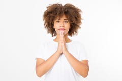 Praying young afro american girl. African woman in summer shirt isolated on white background. Copy space. Mock up. Make a wish Stock Images Praying young afro american girl. African woman in summer shirt isolated on white background. Copy space. Mock up. Make a wish Stock Images