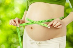 Pregnant belly, woman measure stomach. Prenatal health care royalty free stock photography Pregnant belly, woman measure stomach. Prenatal health care royalty free stock photography