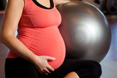 Pregnant woman doing relaxation exercise