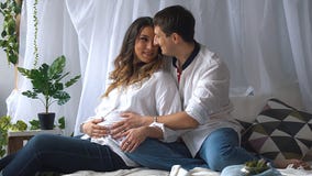 https://thumbs.dreamstime.com/t/pregnant-woman-her-handsome-husband-smiling-beautiful-women-spending-time-together-bed-man-listening-to-baby-113260719.jpg