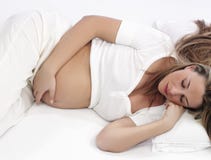Pregnant Woman Sleeping Stock Image