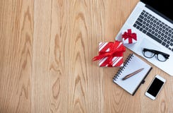 Preparing for Christmas gifts while working stock photo Preparing for Christmas gifts while working stock photo