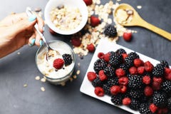 Preparing a healthy granola for breakfast with healthy ingredients royalty free stock photography Preparing a healthy granola for breakfast with healthy ingredients royalty free stock photography