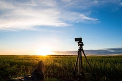Preparing to shoot the sun going beyond the horizon stock image Preparing to shoot the sun going beyond the horizon stock image