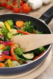 Preparing veggie food vegetables in cooking pan with spatula royalty free stock photo Preparing veggie food vegetables in cooking pan with spatula royalty free stock photo