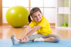Preschooler child girl doing fitness exercises stock photography Preschooler child girl doing fitness exercises stock photography