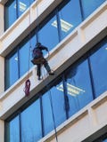 Pressure Washing A Building. Stock Photos