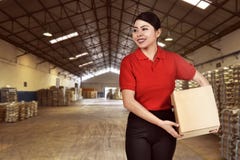 Pretty Asian Courier Woman Bring The Package Stock Image