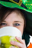 Pretty brunette celebrating Saint Patricks day stock image Pretty brunette celebrating Saint Patricks day stock image