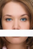 Pretty girl hiding her mouth close-up Royalty Free Stock Photo Pretty girl hiding her mouth close-up Royalty Free Stock Photo