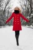 Pretty girl is jumping in snow royalty free stock photo Pretty girl is jumping in snow royalty free stock photo